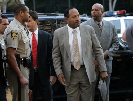 O.J. Simpson arrives at the Clark County Regional Justice Center for the first day of his trial in Las Vegas, Nev., Monday, Sept. 15, 2008. Simpson is facing charges that include burglary, robbery and assault following an alleged robbery at the Palace Station Hotel & Casino in September, 2007. 