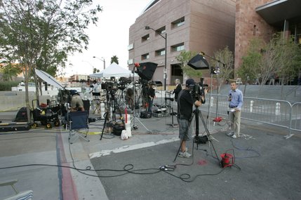 Television news reporters are back behind the Clark County Regional Justice Center for the first day of the O.J. Simpson trial in Las Vegas, Nev., Monday, Sept. 15, 2008. Simpson is facing charges which include burglary, robbery and assault following an alleged robbery at the Palace Station Hotel & Casino in September, 2007. 