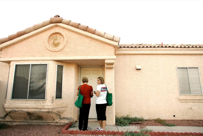 Breeden, left, and daughter Jennifer Breeden go door to door in Breeden's effort to unseat GOP Sen. Joe Heck. The Democrat has yet to publicly share her ideas for solving the state's problems.


