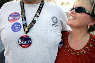 Ed Long, a volunteer and Shirley Breeden supporter, hugs Breeden in September 2008 as they canvass a neighborhood in state Senate District 5 in Henderson. A recently retired school administrator and a political novice, Breeden stresses her experience as a soccer mom and her 
