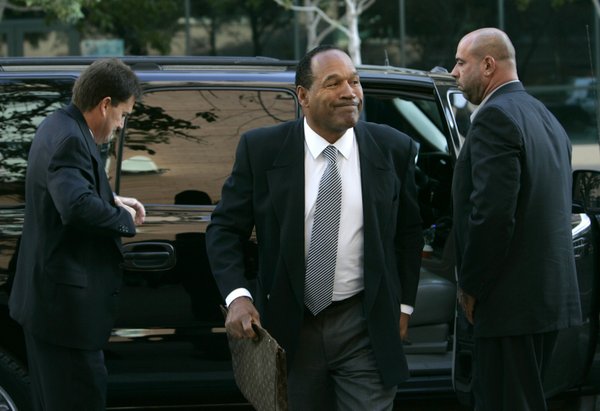 O.J. Simpson, center, arrives at the Clark County Regional Justice ...