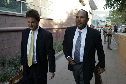 O.J. Simpson, right, and attorney Yale Galanter arrive at the Clark County Regional Justice Center in Las Vegas, Nev. Wednesday, Sept. 17, 2008. Simpson faces charges that  include burglary, robbery and assault following an alleged robbery at the Palace Station Hotel & Casino in Sept., 2007. 