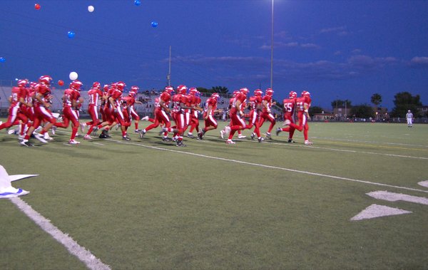 The Valley Vikings enter the field before their game against ...