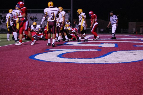 Valley's junior running back Malcolm Wilks (32) reaches in for ...