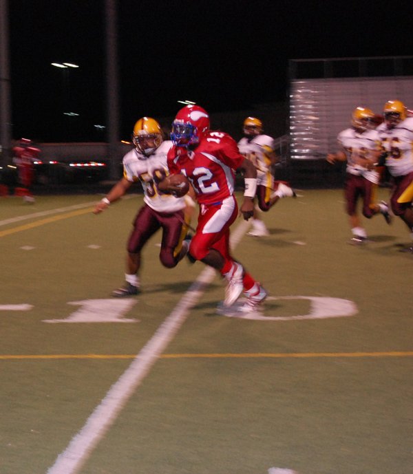 Valley senior quarterback Kerwyn Williams (12) rushes for a touchdown ...