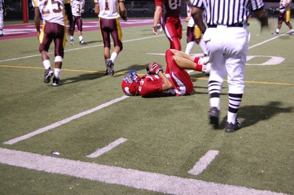 Valley wide receiver Mitchell Dias (23) lays near the 10-yard line after a play in the second quarter on Friday night. 