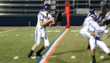 Durango quarterback Chase Roberts looks for a receiver during the first quarter of Friday's game at Bishop Gorman.