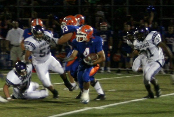 Bishop Gorman's Kawika Antolin carries the ball during Friday night's ...