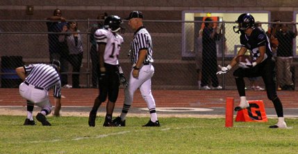 Desert Pines wide receiver Anthony Ruiz, right, pleads his case on a disputed catch in the third quarter against Las Vegas High. Ruiz believed that he caught a touchdown pass from quarterback Dalton Leilua, but the referees determined that he had trapped the ball.