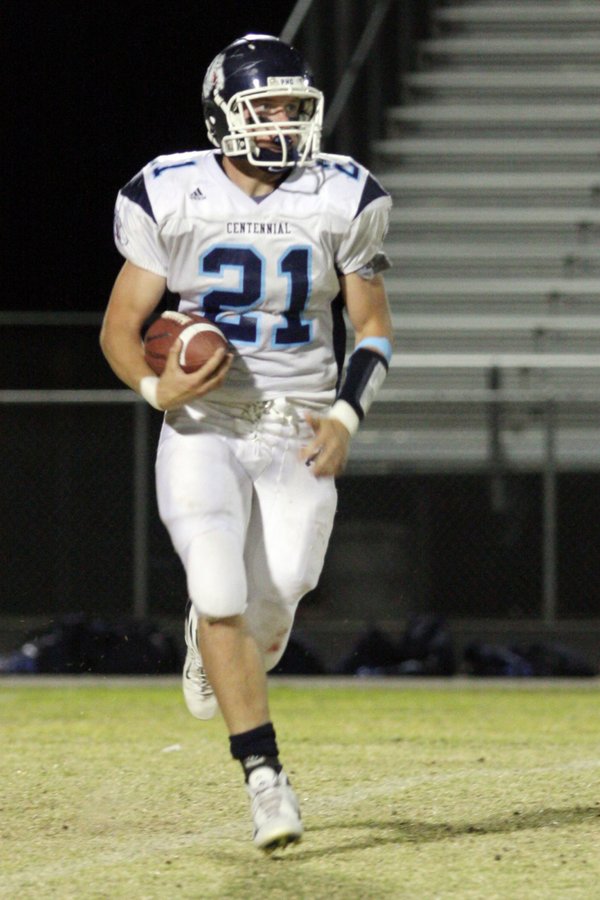 Centennial wide receiver Matt Holley makes a run for the ...