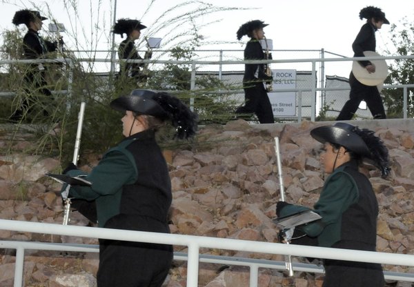 The Palo Verde marching band makes its way toward the ...