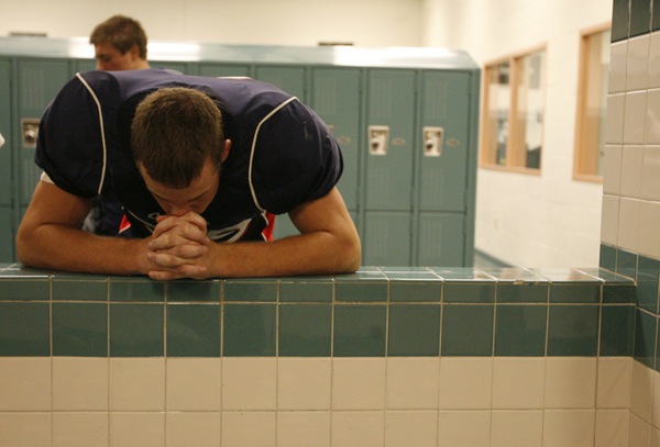 Coronado wide receiver Darren Smith pauses for a moment in ...