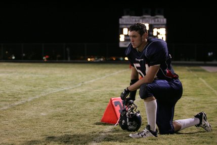 Coronado's Christopher Johnson (54) looks on from the sidelines during Friday's home game against Basic.