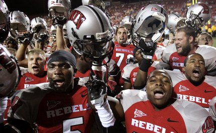 UNLV celebrates its 34-31 overtime win over Iowa State at Sam Boyd Stadium.