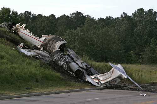 The wreckage of a Learjet that was carrying Blink-182 drummer Travis Barker, Adam Goldstein, aka DJ AM, and four others rests on an embankment in September 2008 in South Carolina.