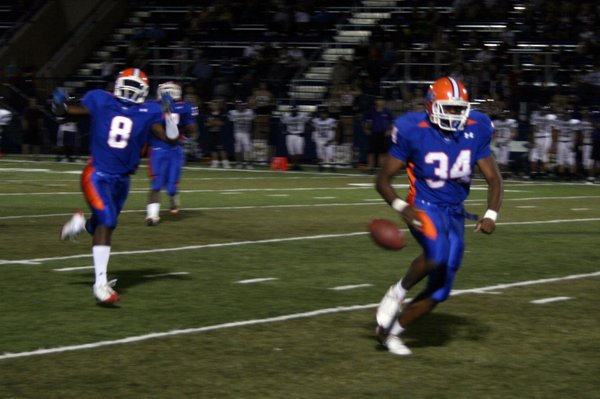 Bishop Gorman's Sam Aigbe misses a catch during Friday's game ...