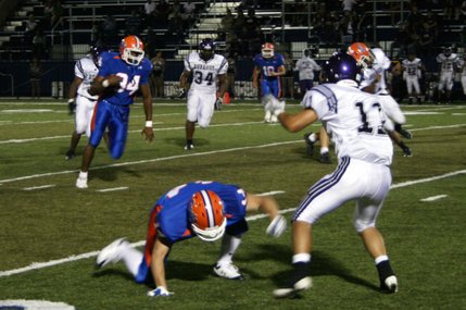 Bishop Gorman's Sam Aigbe runs the ball during Friday's game against Durango. Aigbe rushed 27 yards for the Gaels.