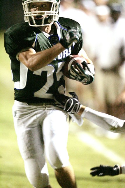 Green Valley's Kyle Larimer runs 22 yards for a touchdown against Foothill on Sept. 19.