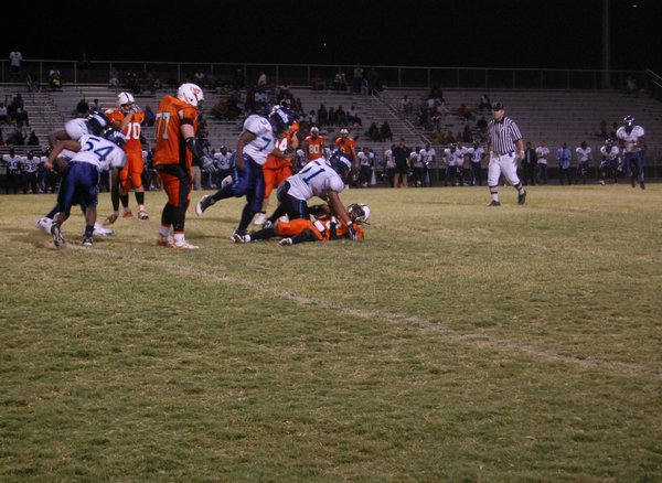 Chaparral senior quarterback Jermal Turner (8) gets tackled after a ...
