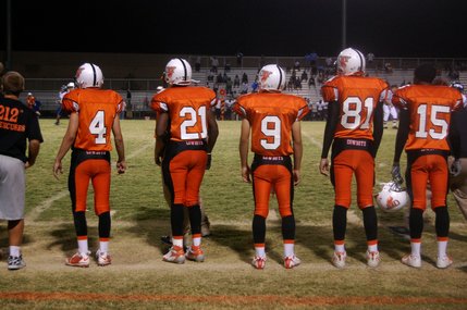 Chaparral players watch from the sidelines during the fourth quarter on Friday night. 
