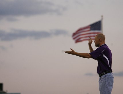 Silverado band director Jeff Lance leads the band before Friday's football game against Liberty.