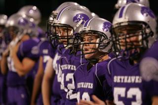Silverado football players look on from the sidelines during Friday's home game against Liberty.
