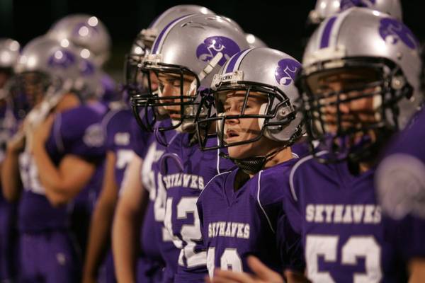 Silverado football players look on from the sidelines during Friday's ...