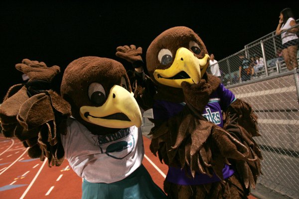 Silverado's mascots offer encouragement from the sidelines during Friday's game ...