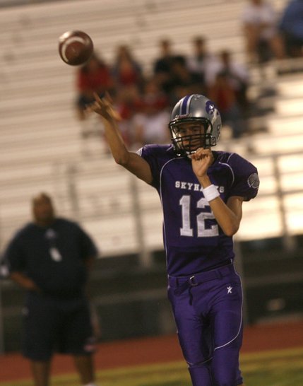 Silverado quarterback Kyle Simmons throws a pass during Friday's home game against Liberty.