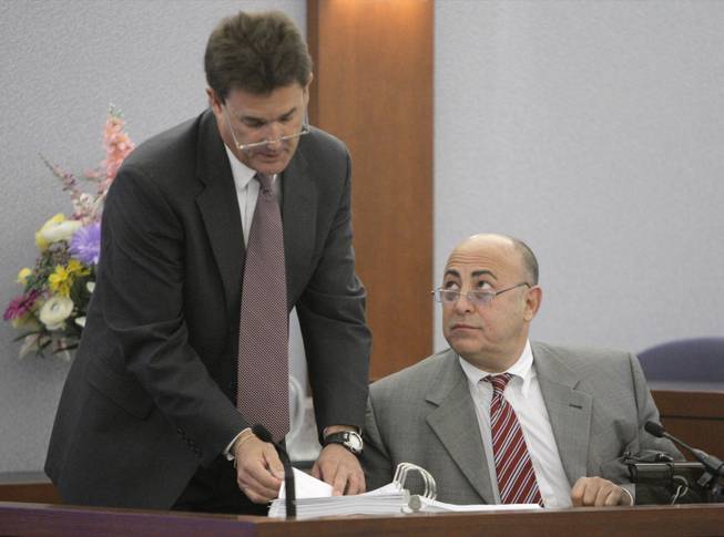 Attorney Yale Galanter, left, cross examines Charles Ehrlich, a longtime friend and former co-defendant with O.J. Simpson, during O.J. Simpson's trial Tuesday, Sept. 23, 2008, in Las Vegas.