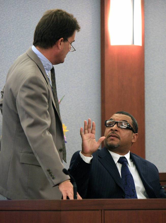 Walter Alexander, right, asks O.J. Simpson's attorney Yale Galanter to back away as Galanter cross examines him during Simpson's trial in Las Vegas, Wednesday, Sept. 24, 2008. Simpson faces 12 charges, including felony kidnapping, armed robbery and conspiracy. 