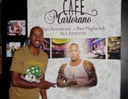 San Antonio Spurs forward Bruce Bowen signs "the wall."