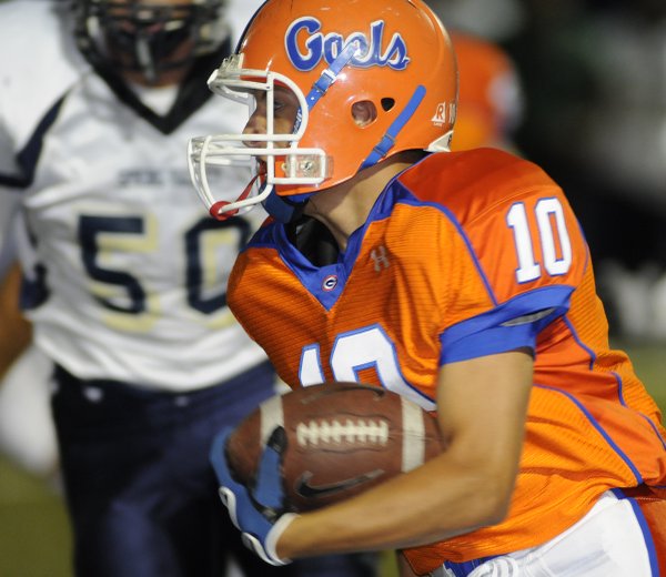 Gaels running back Joe Huber (10) is pursued by Spring ...