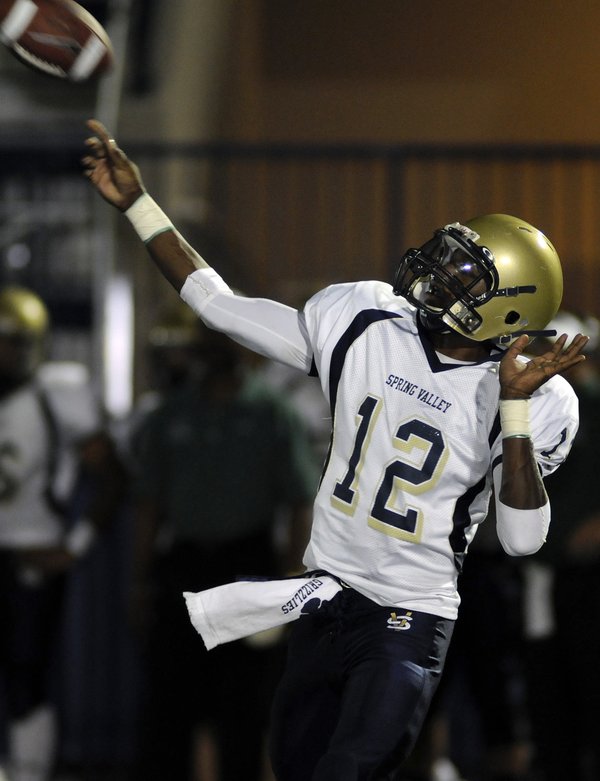 Spring Valley quarterback Anton Stallworth lets a pass go in ...