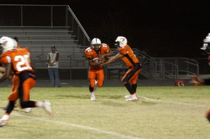 Chaparral quarterback Breonta Griffin passes the ball to running back Isaiah Washington during Friday's game against Las Vegas High.