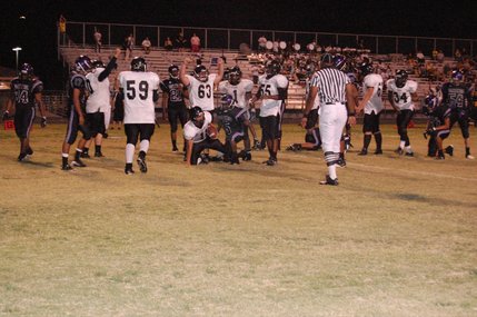 Clark celebrates quarterback Anthony Lotta's (11) touchdown in the fourth quarter. 