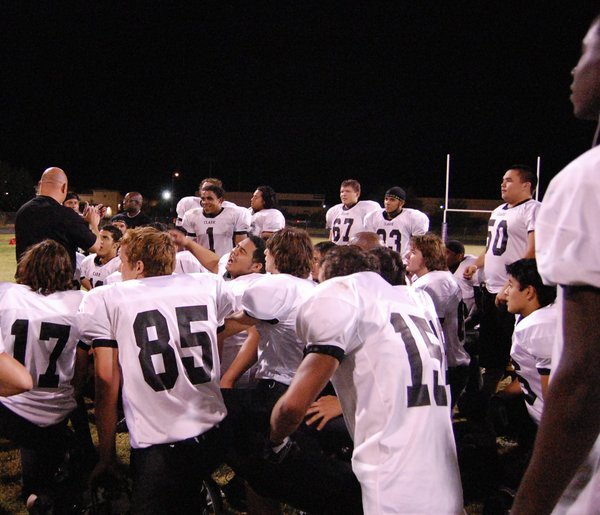 Clark head coach Don Willis talks to his team after ...