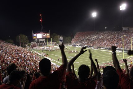 Fans cheer as the Rebels take the field for their game against UNR at Sam Boyd Stadium in September 2008. 