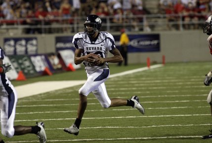 UNR quarterback Colin Kaepernick runs with the ball against UNLV at Sam Boyd Stadium.