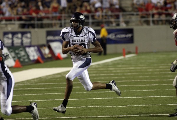UNR quarterback Colin Kaepernick runs with the ball against UNLV ...