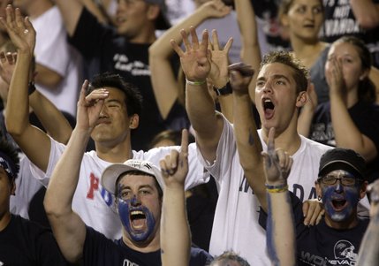 UNR fans celebrate as time runs out for UNLV in their game against the Wolf Pack at Sam Boyd Stadium.