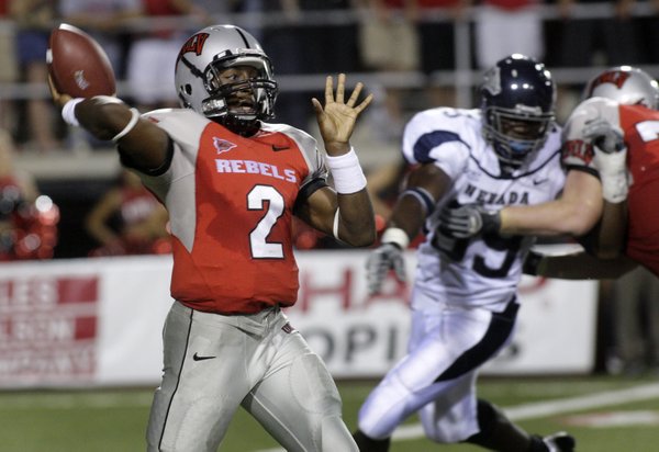UNLV quarterback Omar Clayton passes against UNR.