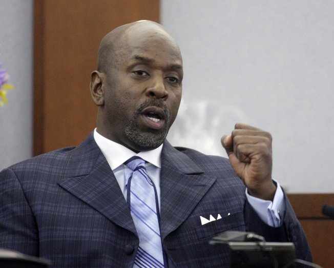 Michael McClinton testifies during O.J. Simpson's trial at the Clark County Regional Justice Center Friday, Sept. 26, 2008, in Las Vegas. Simpson faces 12 charges, including felony kidnapping, armed robbery and conspiracy.