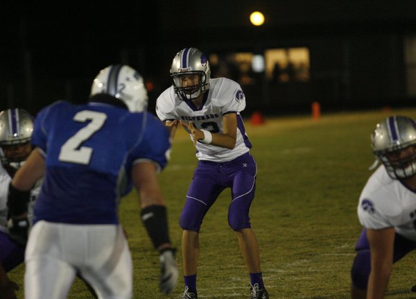 Silverado quarterback Kyle Simons (12) makes a call during Friday's ...