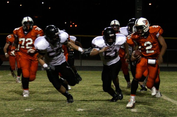 Chaparral quarterback Breonta Griffin (2) tries to avoid Las Vegas ...