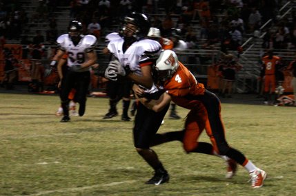 Chaparral's Edward Weist tackles Las Vegas' Saeveon Bulter during Friday's game at Chaparral.