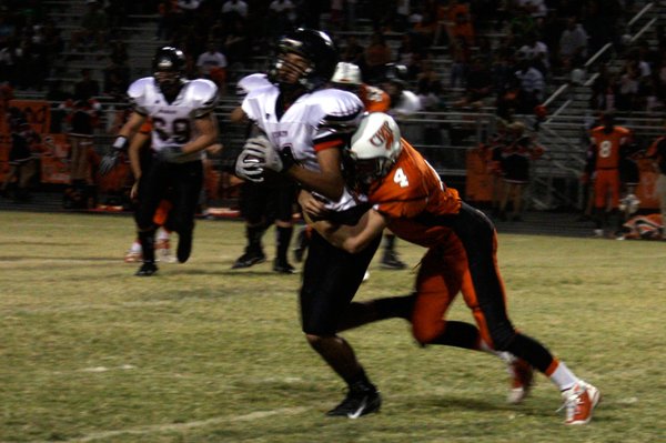 Chaparral's Edward Weist tackles Las Vegas' Saeveon Bulter during Friday's ...