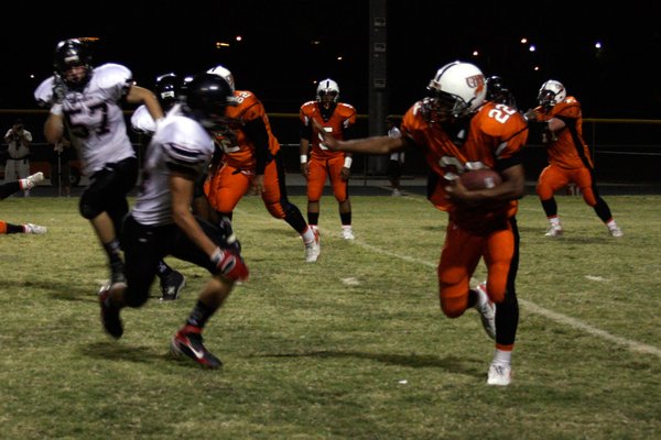 Cowboys running back Isaiah Washington tries to dodge Las Vegas ...