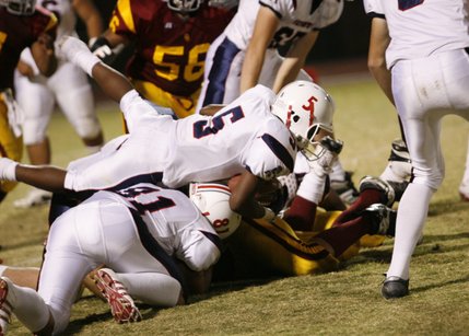 Liberty running back Ty Byrd looks for yardage against Del Sol Friday.