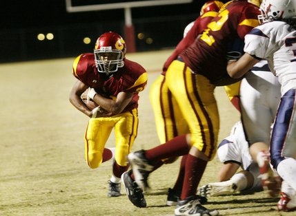 Del Sol running back Jordan Molina carries the ball for a touchdown during a home game against Liberty Friday.